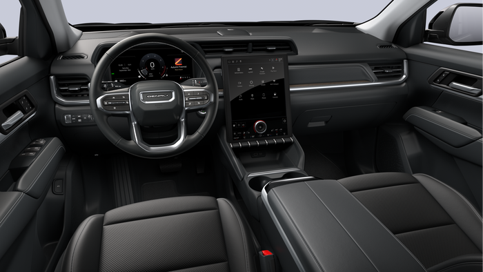2026 GMC Terrain interior featuring digital driver display, large vertical touchscreen infotainment system, and modern SUV dashboard layout.