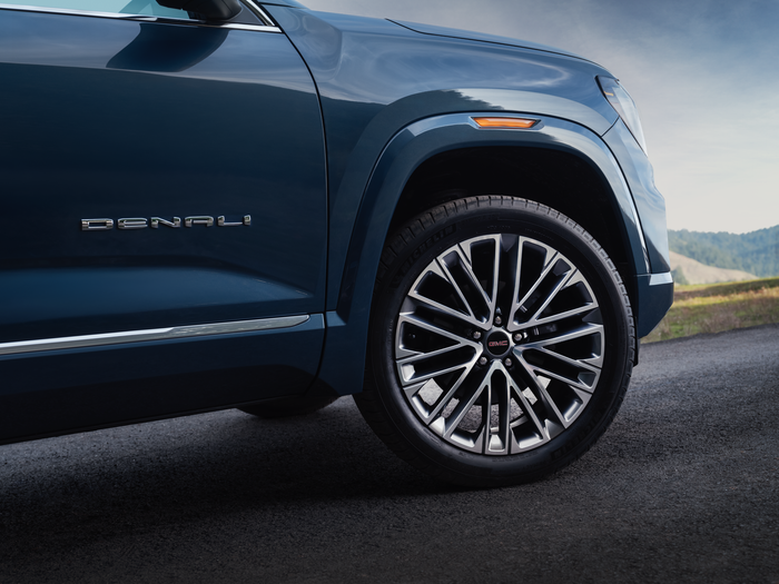 2026 GMC Terrain Denali wheel and side badge detail showing premium alloy wheel design and upscale compact SUV styling.