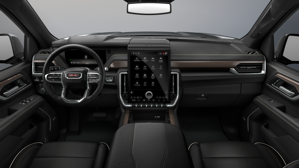 Interior of 2026 GMC Yukon XL Elevation showing driver cockpit with 16.8-inch touchscreen, digital display, steering wheel controls, and center console layout