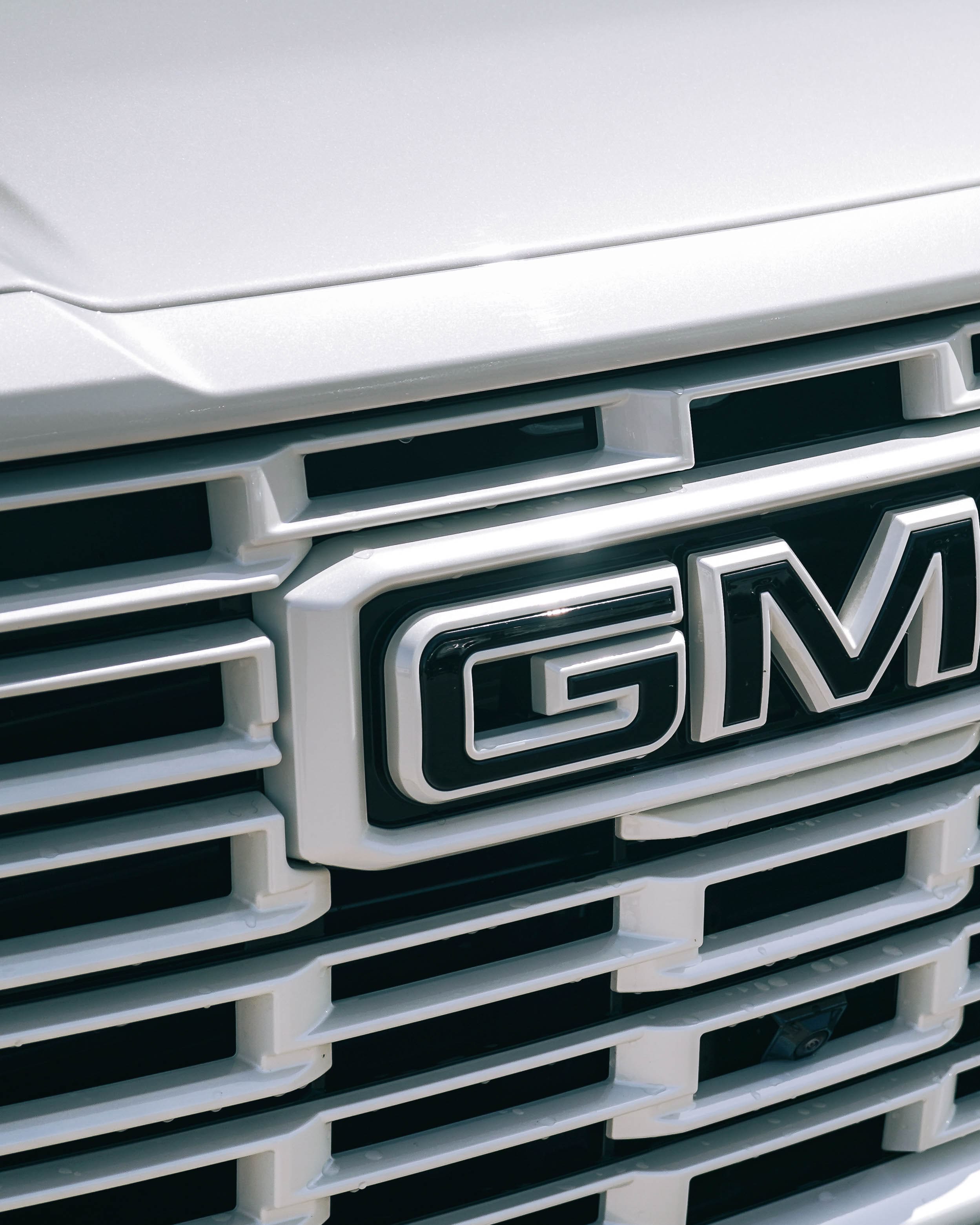 thumbnail image 2 of Genuine GM OEM GMC Denali Tailgate Emblem – Chrome – Part #23400376 2 of 5
