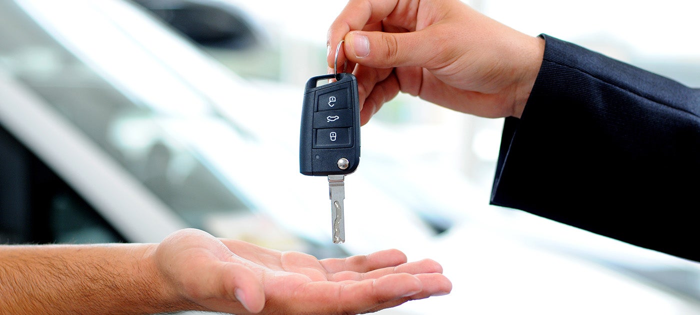 Handing customer car keys